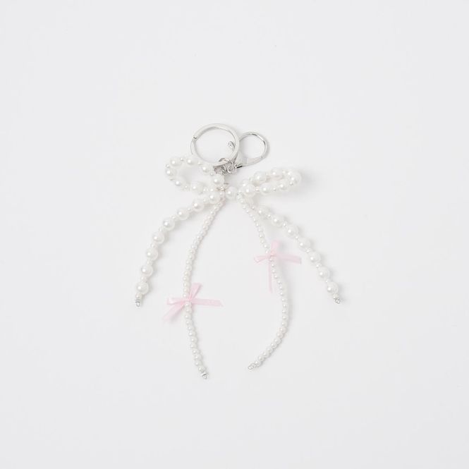 Hovedbilde Veskepynt perle SLØYFE - hvit/rosa